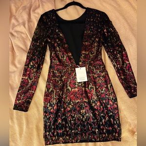 New tags still on XS deep back plunge line sequence dress